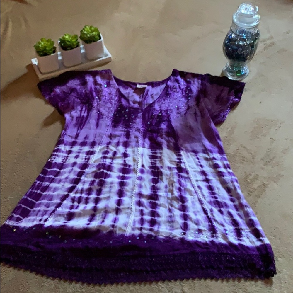 Purple and white top.